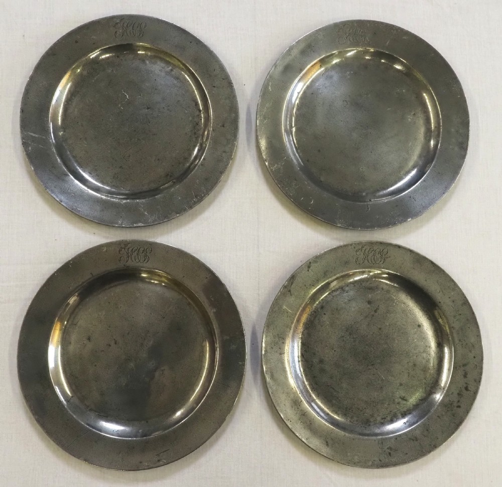 a set of four antique english pewter plates by t h compton 1814 1835